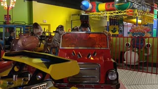 Spencer driving cars at Chuck e Cheese VID_20180422_143938