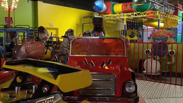 Spencer driving cars at Chuck e Cheese VID_20180422_143938