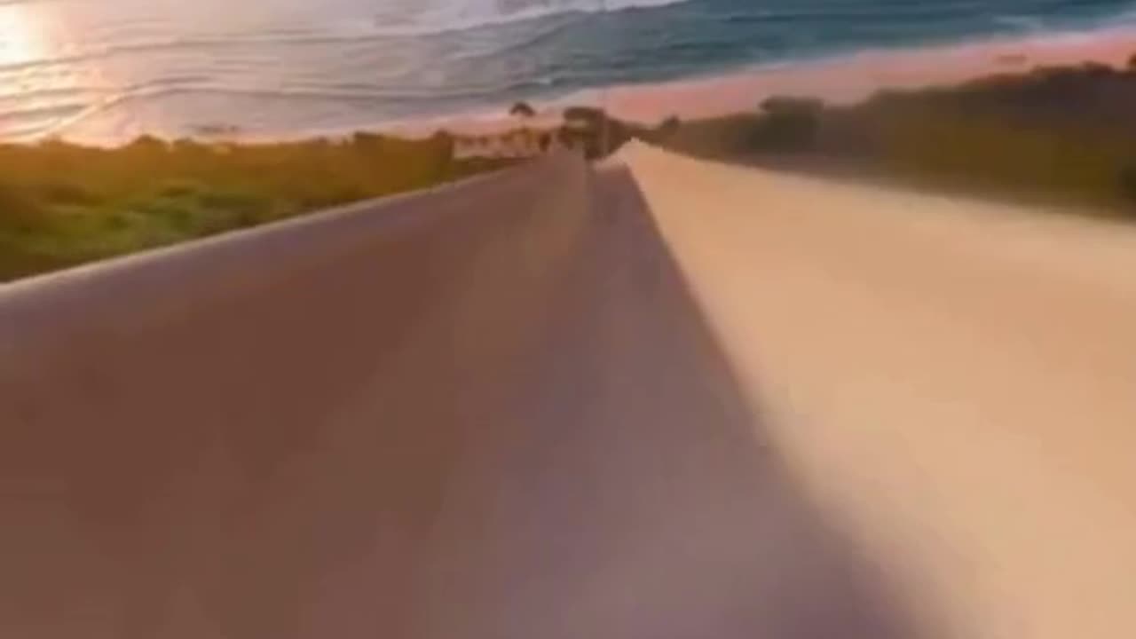 Water slide that ends in the sea—this ride is insane! 🌊😱 #EpicSplash
