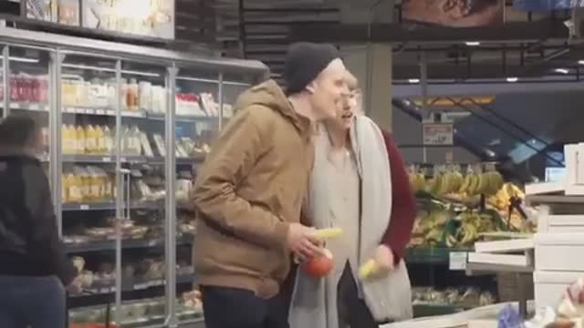 Mock Christmas singing at the apartment store