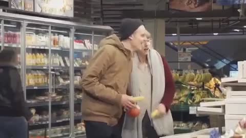 Mock Christmas singing at the apartment store