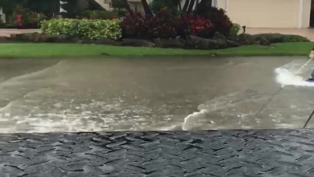Tropical Storm Kneeboarding in the Streets
