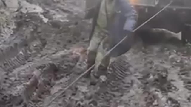 American supplied armoured vehicles stuck in mud in Ukraine.