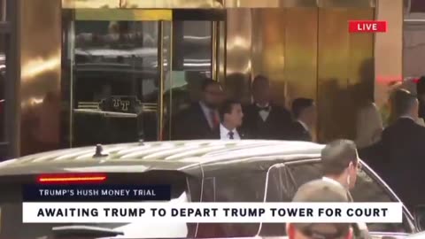 President Trump leaves Trump Tower this morning sporting a gold tie.