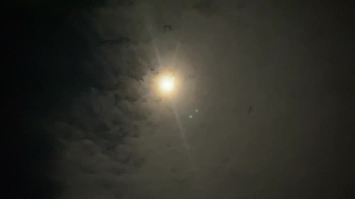 The full moon shining brightly above the sky in Korea, It seems to float like a sea star.