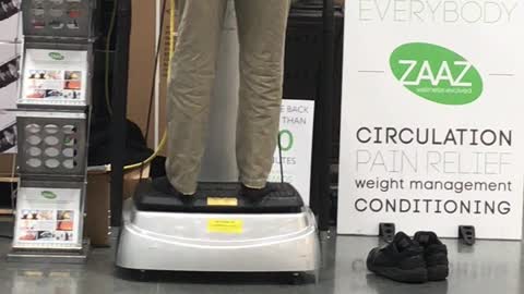 Man testing massager at Costco!