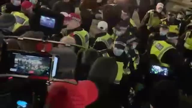 Protesters in London tonight surround Police chanting, Shame on You