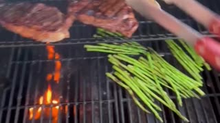 Grilled Jamaican Jerk Ribeyes w/ Asparagus