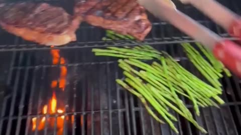 Grilled Jamaican Jerk Ribeyes w/ Asparagus