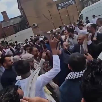 Video footage of mass knife brandishing among a congregation of counter protestors