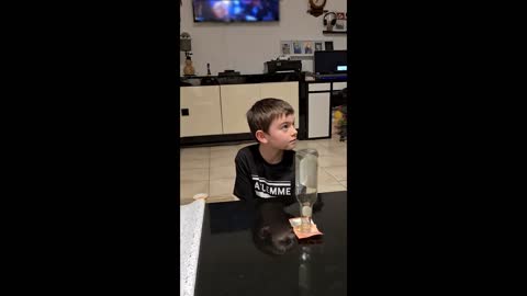 Boy Outsmarts Dad and Pulls Money Bill Kept Under Bottle Without Touching It