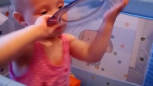 Playing with a plate on your forehead