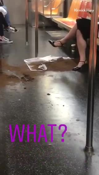 What a pile of dirt on floor subway train