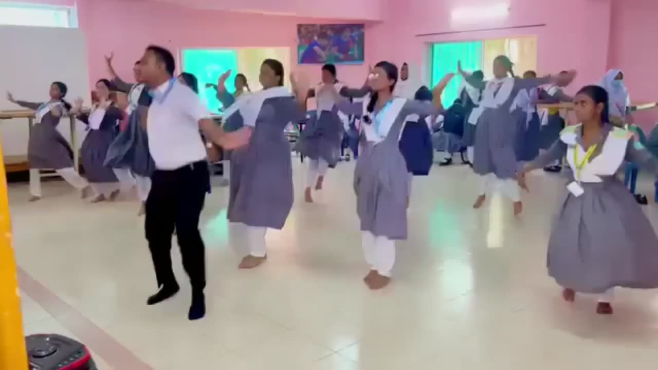 Funny dance with teacher and student