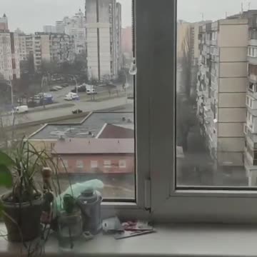 Russian tank swerves in to civilian car crushing it with people inside.