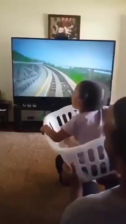 Baby goes on rollercoaster ride