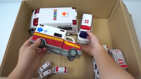 An ambulance miniature car runs urgently. Introduce and run on a slope