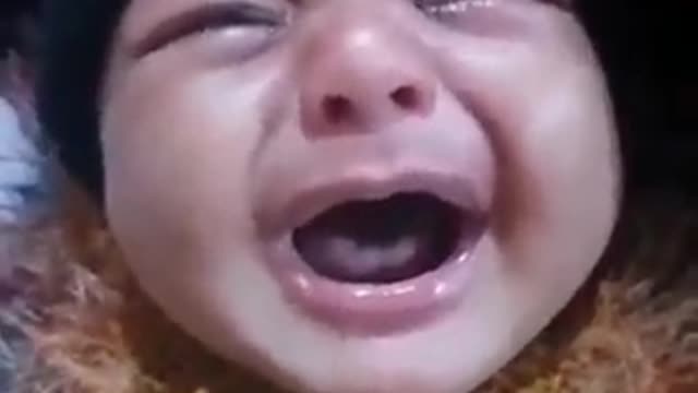 UKRAINIAN BABY CRYING FELT SLICE MY HEART.