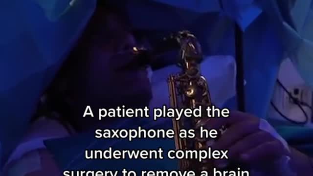 A patient played the saxophone as he underwent complex surgery