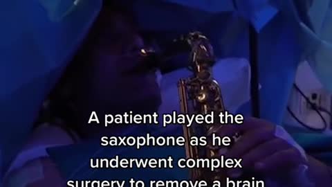 A patient played the saxophone as he underwent complex surgery