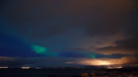 Aurora behind clouds