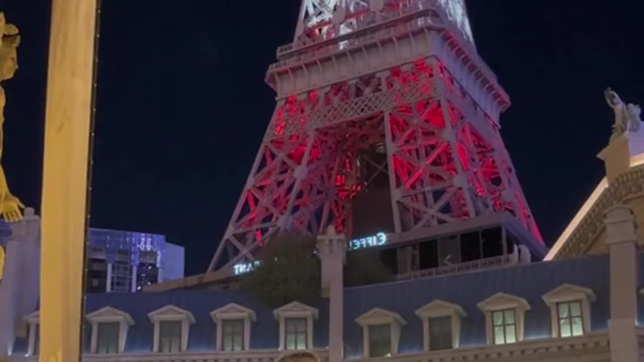 Beneath the dazzling lights of Las Vegas, the Eiffel Tower stands tall as a captivating backdrop. 🌃✨