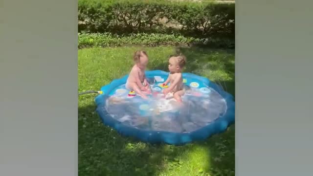 Funny Babies Playing With Water
