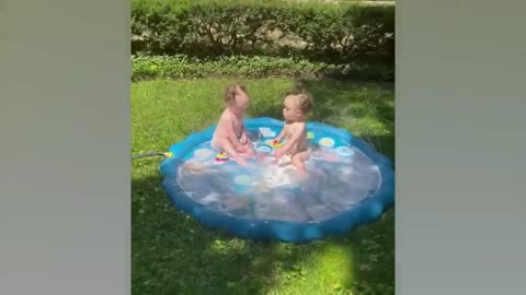 Funny Babies Playing With Water