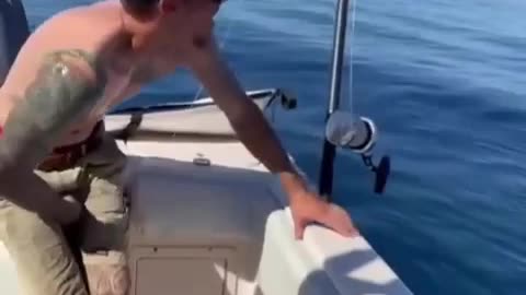 Guy Gets Hit in the Nuts After Catching Tuna