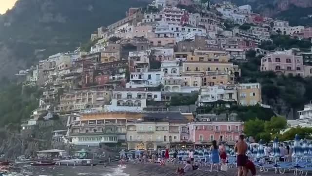 POV: It's summer in Italy.you re swimming in this amazing beach and this is your view