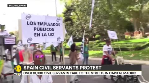 Over 10,000 civil servants take to streets in Spain over wage rise | Latest News | WION