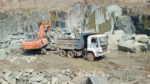 JCB 3DX Loading Marvel: "JCB 3DX Super Power: Stone Loading Marvel in Action!
