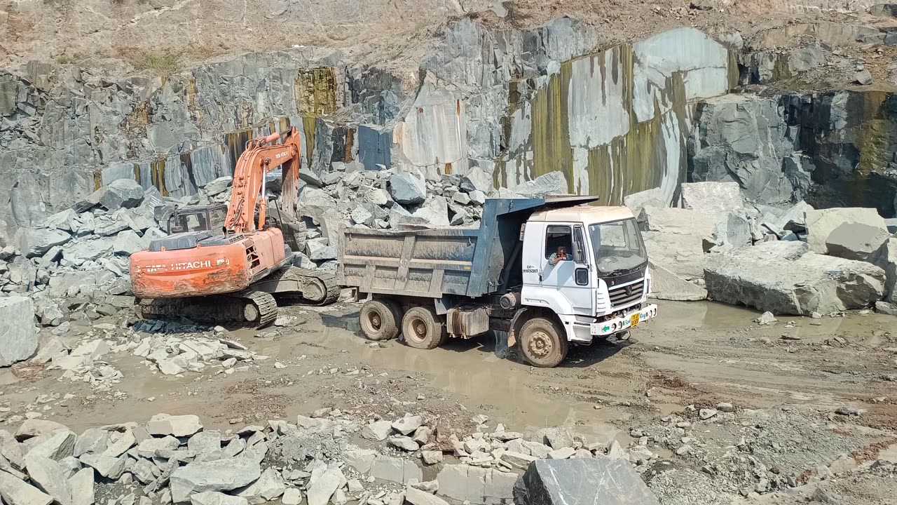 JCB 3DX Loading Marvel: "JCB 3DX Super Power: Stone Loading Marvel in Action!