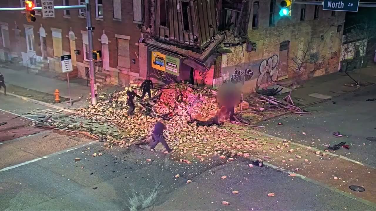 Fatal crash in Baltimore MD Car runs red light, crashes into building, building collapses No sound
