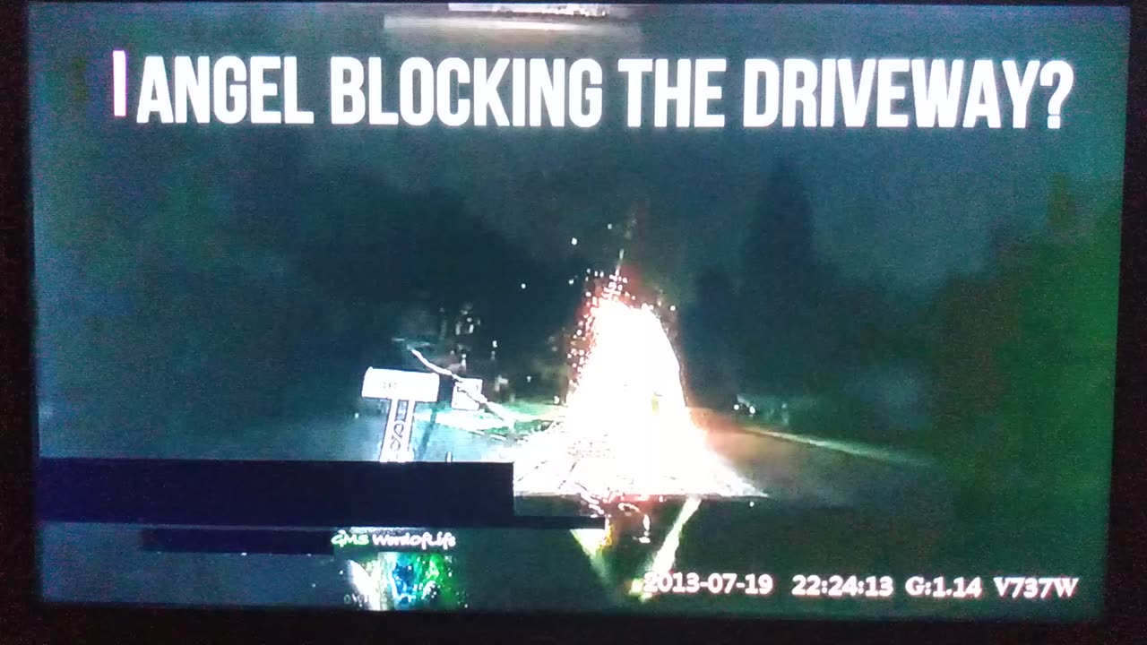 MAN RECORDS WHAT LOOKS LIKE A ANGEL IN HIS DRIVEWAY..GMS WORDOFLIFE