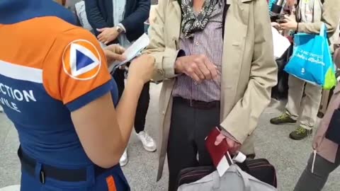 Videos shows First vaccine Pass being used in Lyon station, France " Wrist bracelet "