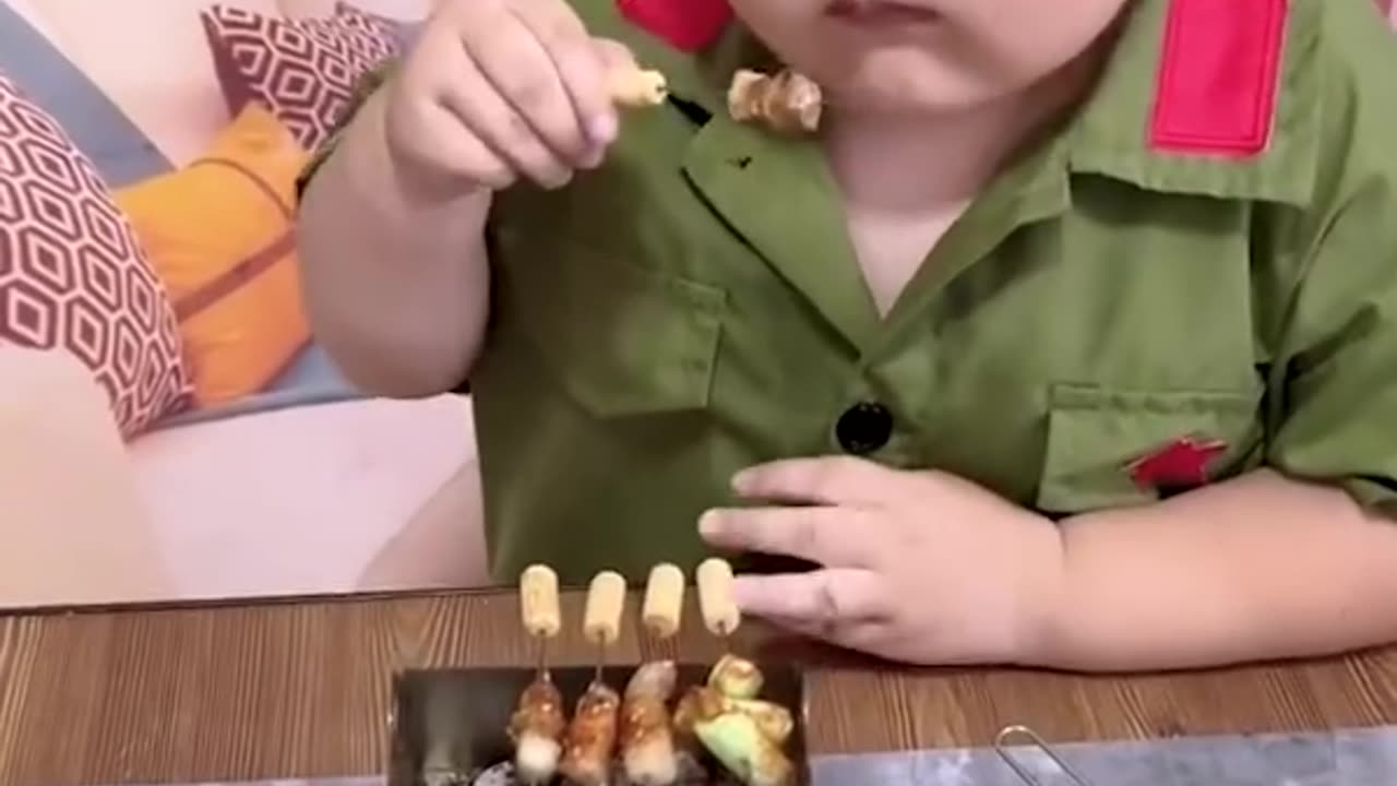 Boy cooking demo with little kitchen appliances