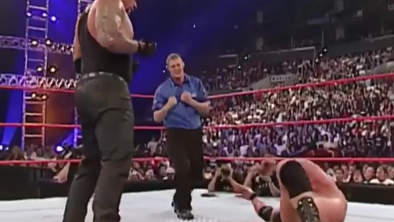 The Undertaker used chair and gave lesson to Brock Lesnar