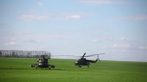 Mi-8MTV-5-1 helicopters providing route security for Russian convoys