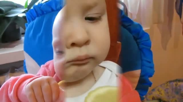 Funny kids reaction on tried lemon at the first time.