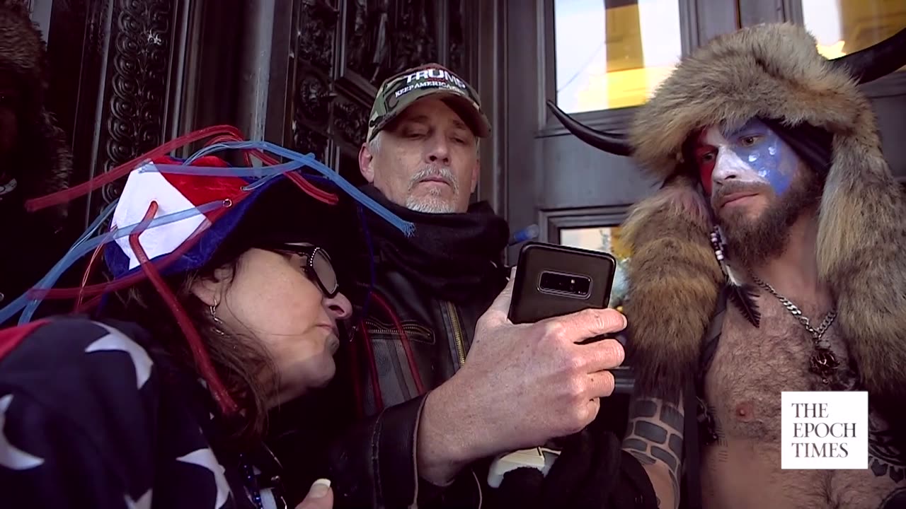 "QAnon Shaman" Jacob Chansley Tells Jan. 6 Crowd It's Time to Go Home