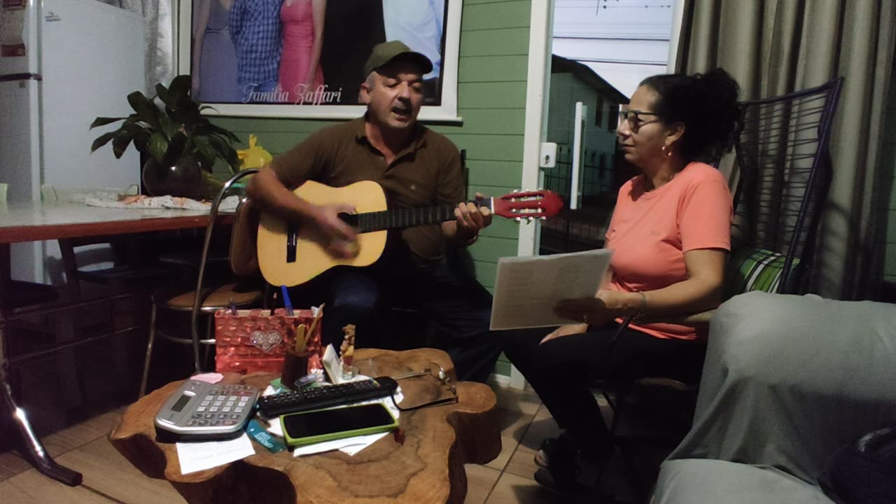 Pai e a mãe no violão (escudo - a voz da verdade)