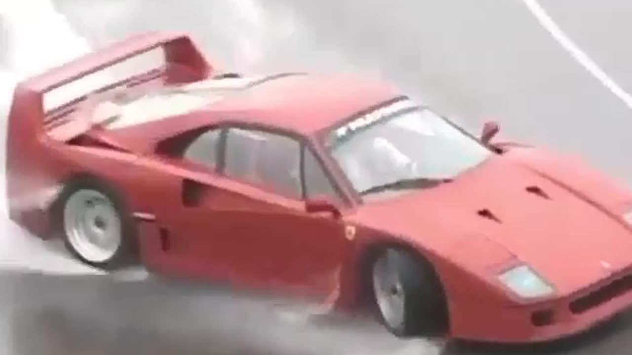 old lambo drifting pon wet watery road