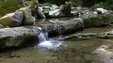 20 SECONDS CAUGHT IN 4K PEACEFUL WATERFALL VIEW