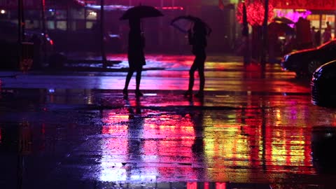 Video Of People Waiting For A Taxi On A Rainy Night