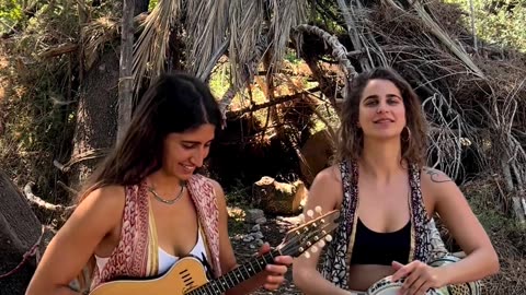 Playing a song by two beautiful girls