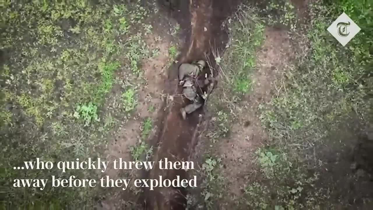 Moment Russian soldier catches and throws away Ukrainian 'drone bombs'