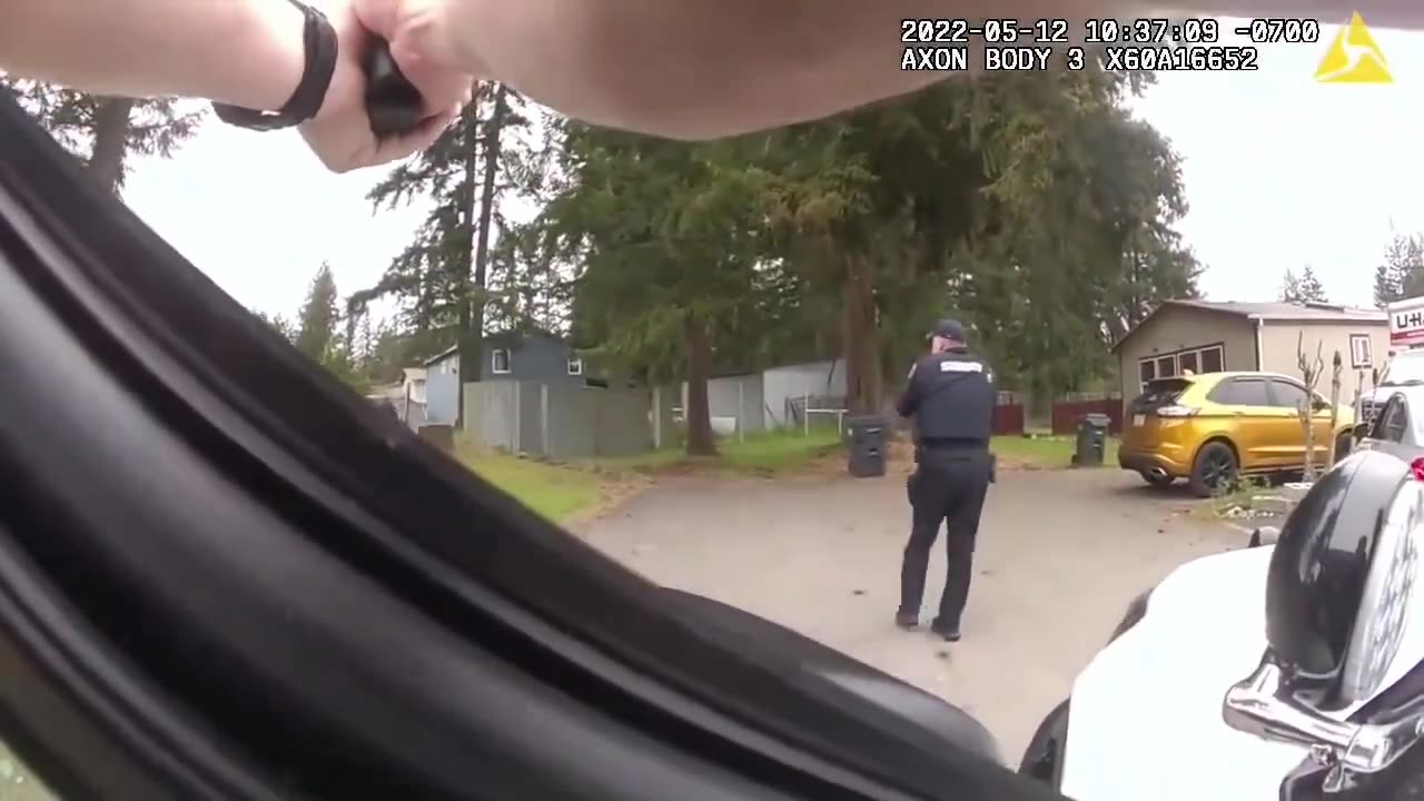 BodyCam Video Shows An Armed Carjacking Suspect Fleeing From Police and then shots fired