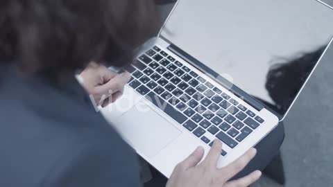 Cropped Shot Of Laptop And Hands Of Business Woman Sitting Outside And Typing