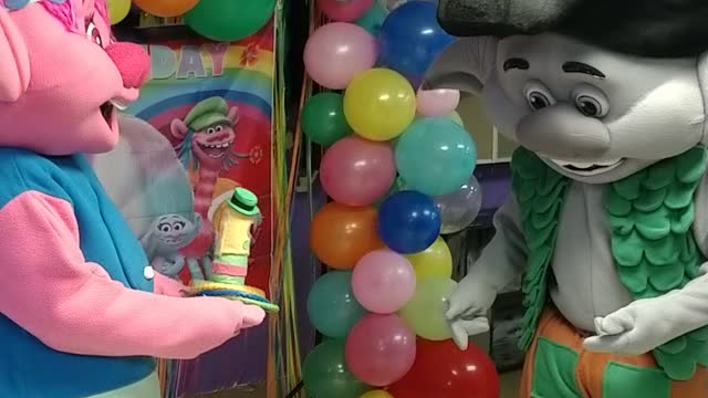 Trolls play Mr dingles ring toss game in Pasadena Texas at a birthday party